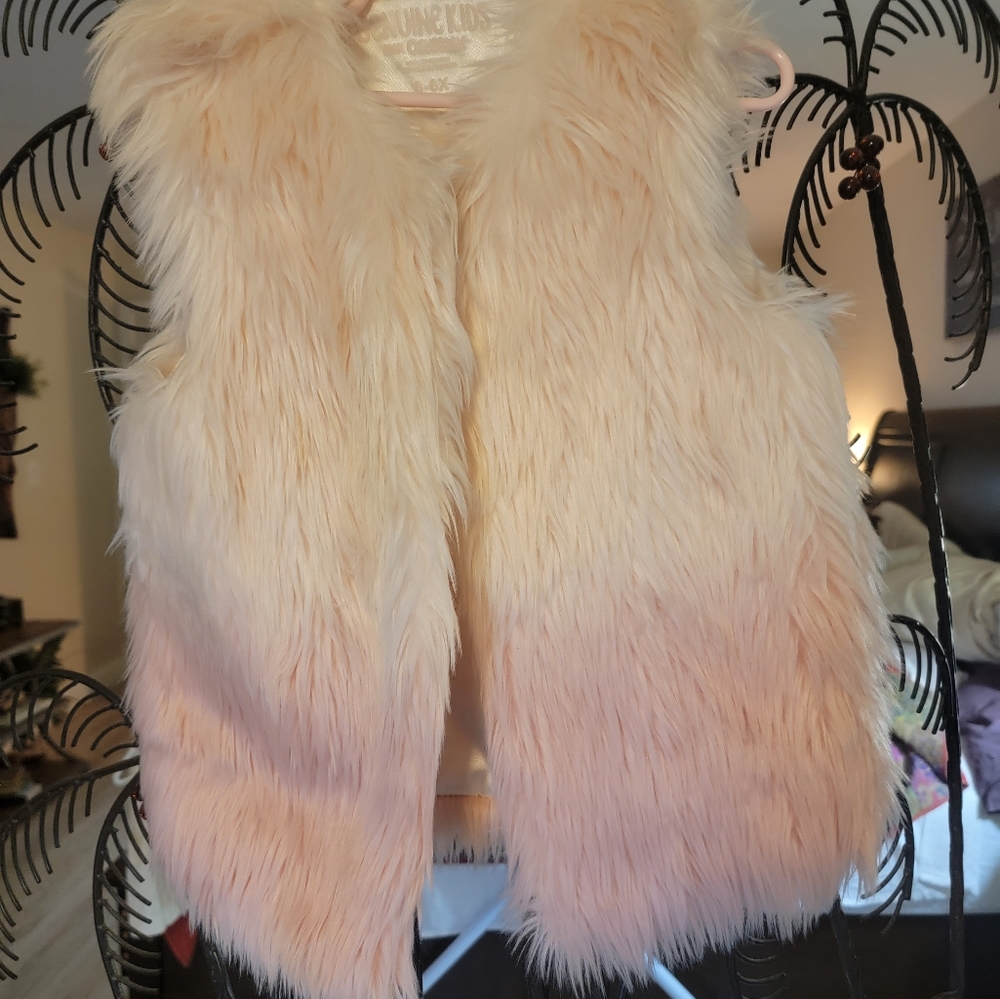 Adorable furry vest